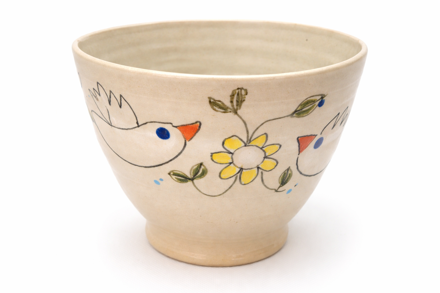 Bol en céramique décoré de deux oiseaux et d'une fleur jaune