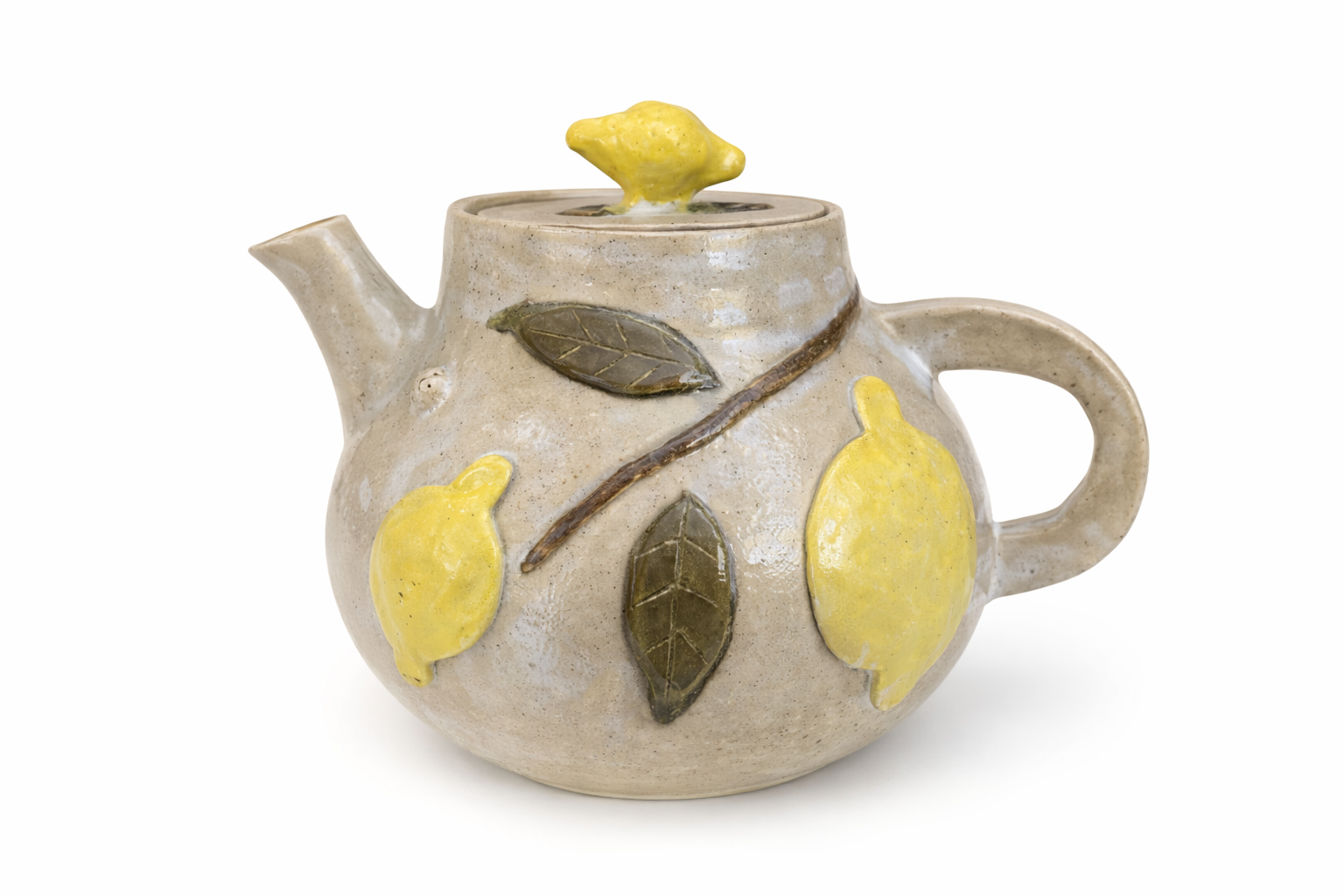 Théière en céramique beige décorée de citrons
